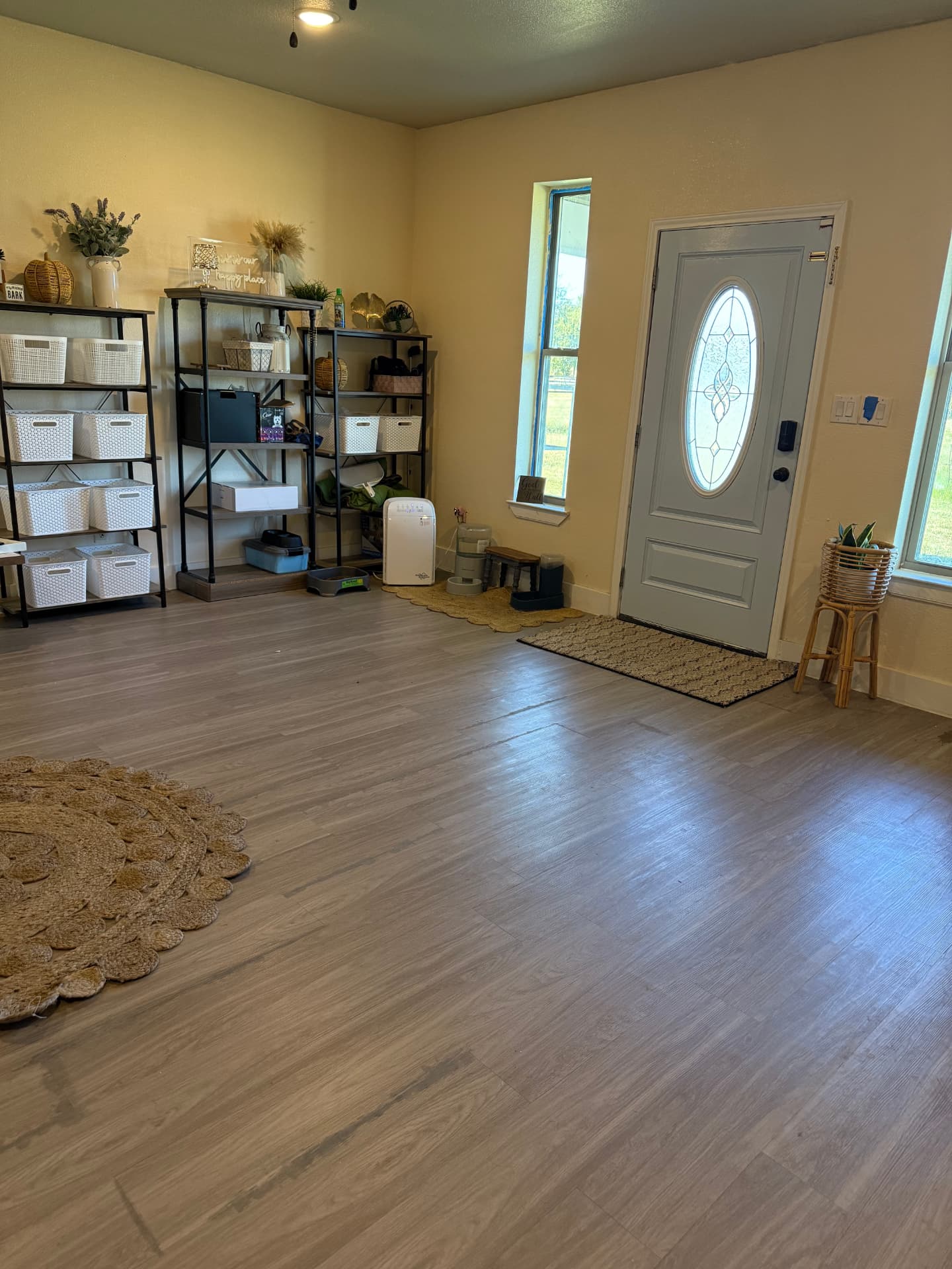 Organized pet care entry with feeding and storage stations